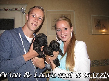 Arjan en zijn zus Laura met een Grizzly